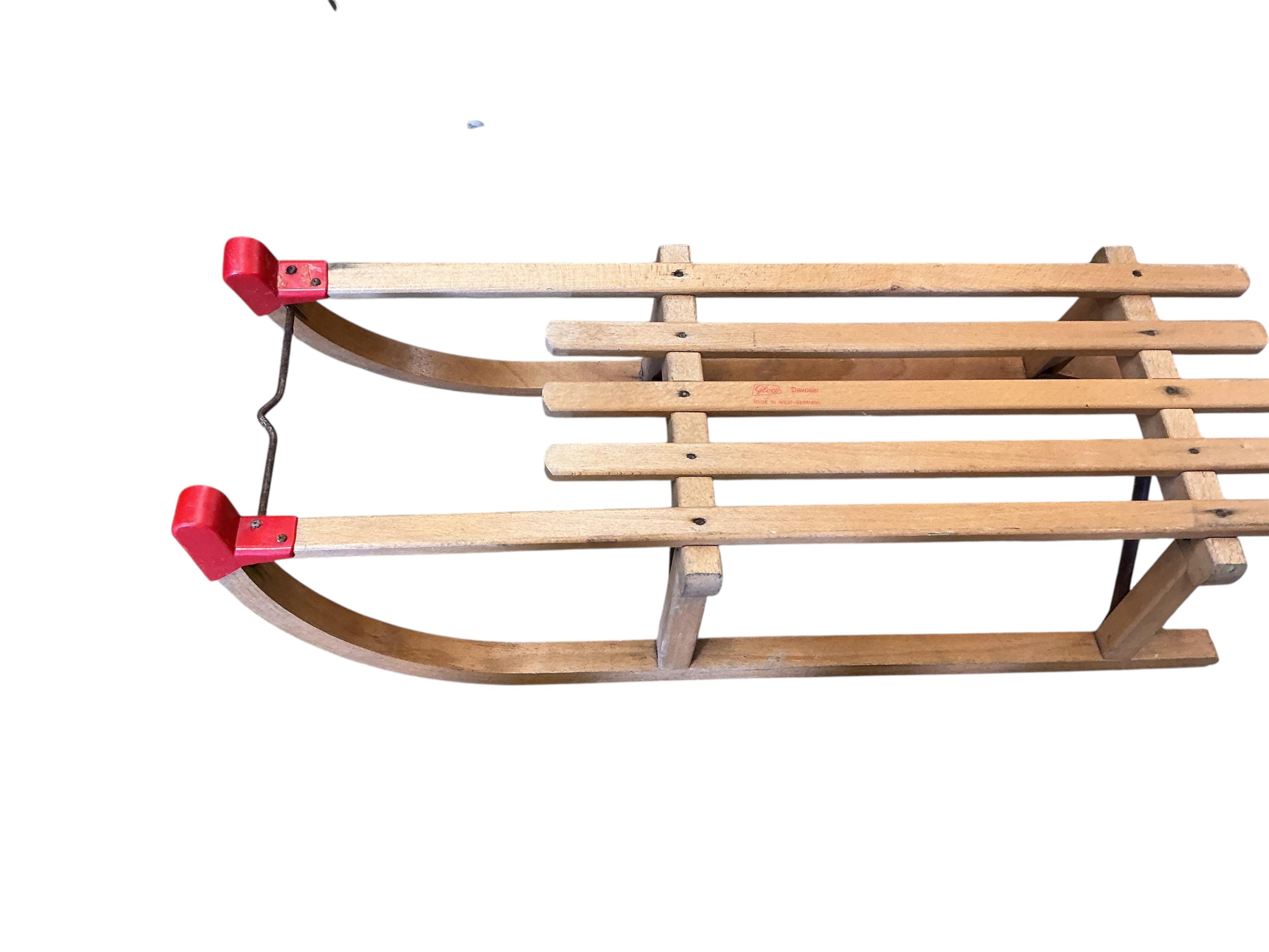 Three vintage Davos sledges
